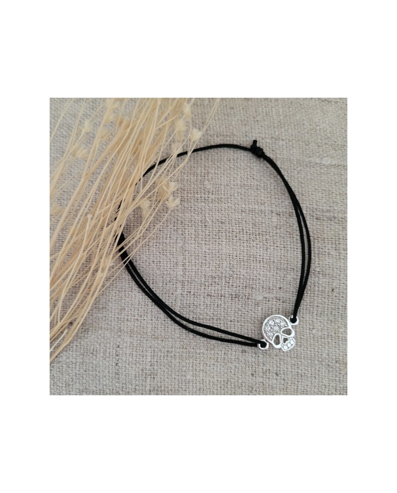 Bracelet tête de mort plaqué Or sur lien fin satiné