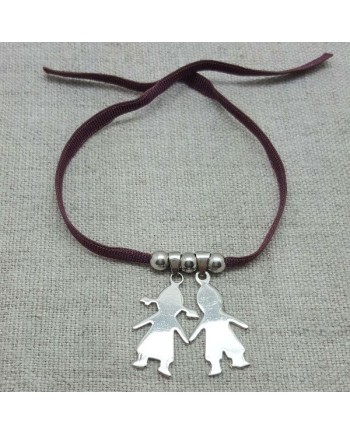 bracelet breloque personnage sur lien elastique