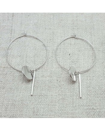 Boucles d'oreilles créole avec motifs géométriques