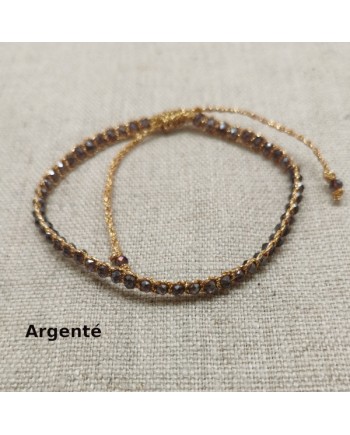 Bracelet perles facettes colorées et fil doré