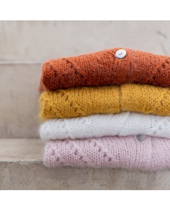 Gilet boutonné mohair sans manche ajouré