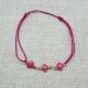 Bracelet lien coton et motifs émaillés rose
