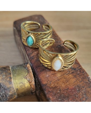 Bague acier doré, pierre poire sertie