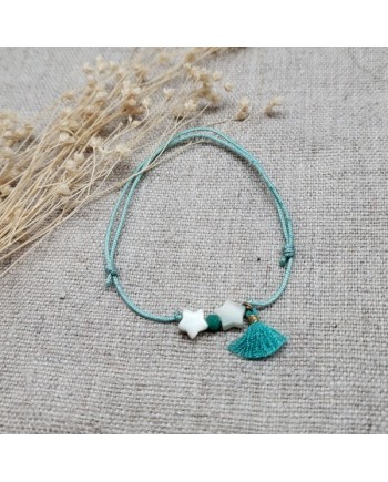 Bracelet multi étoiles en nacre sur lien fin satiné rose