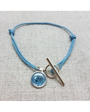 Bracelet religieux fermoir argent et médaille miraculeuse sur lien coton bleu