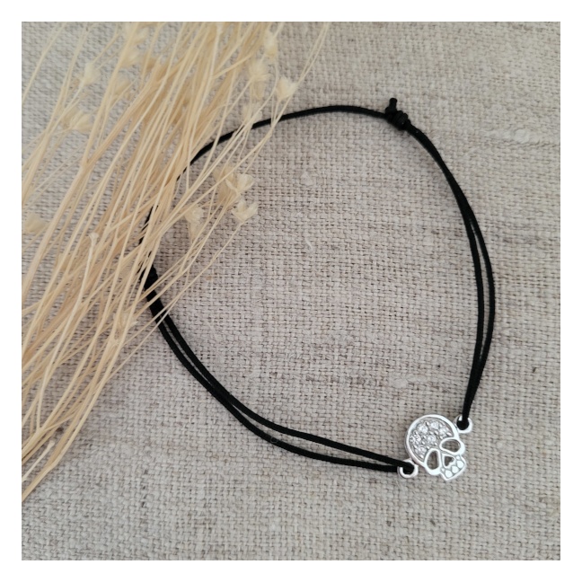 Bracelet tête de mort plaqué Or sur lien fin satiné