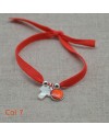 Bracelet religieux croix en nacre et médaille vierge orange sur lien elastique 