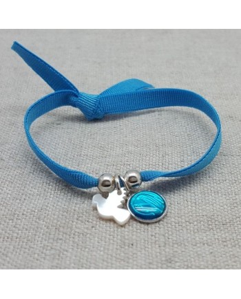 Bracelet religieux colombe en nacre et médaille vierge bleue sur lien elastique 